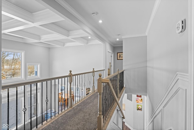 hall featuring crown molding, beamed ceiling, an upstairs landing, recessed lighting, and coffered ceiling