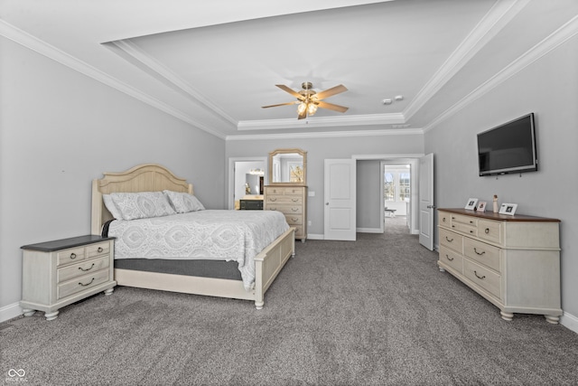 bedroom featuring carpet flooring, a tray ceiling, ceiling fan, and crown molding