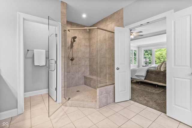 78 Chatham Brook Dr, Westfield, IN 46074 - ensuite bathroom with ceiling fan, a shower stall, tile patterned flooring, and baseboards