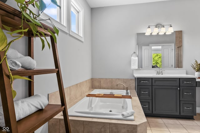 78 Chatham Brook Dr, Westfield, IN 46074 - bathroom with healthy amount of natural light, vanity, a garden tub, and tile patterned floors