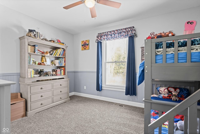 78 Chatham Brook Dr, Westfield, IN 46074 - bedroom with carpet, wainscoting, and a ceiling fan