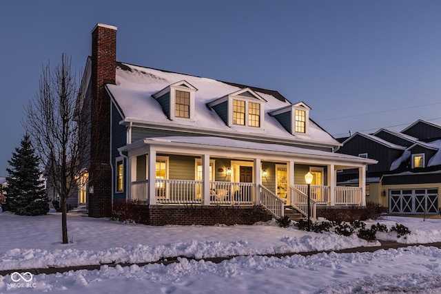 cape cod house with covered porch