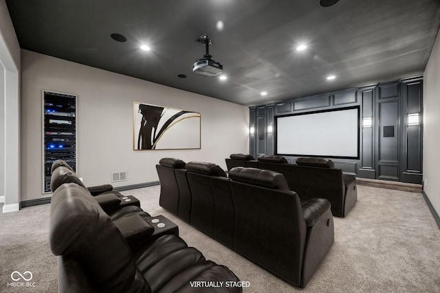 home theater with light colored carpet