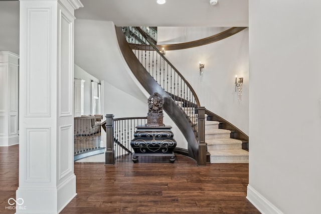 stairs with wood-type flooring