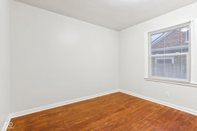 empty room featuring hardwood / wood-style floors