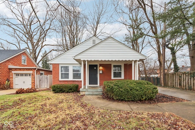 bungalow-style house featuring a garage