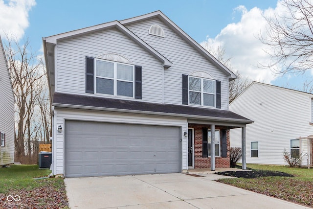 front facade featuring covered porch, central AC unit, and a garage