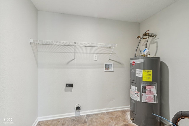 clothes washing area featuring washer hookup, electric dryer hookup, light tile patterned floors, and electric water heater