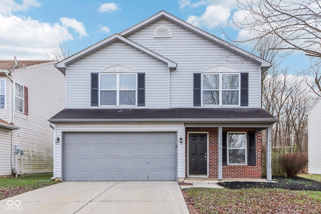 front of property with a garage