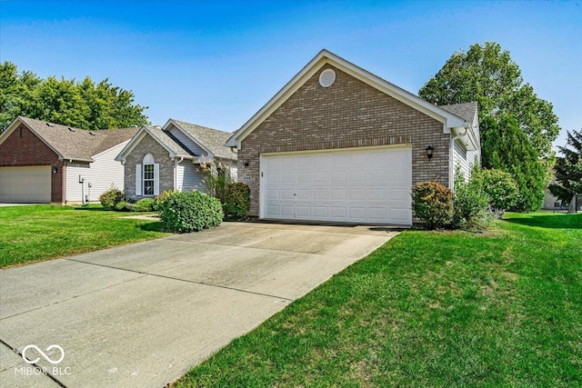 view of front of home featuring a front yard and a garage