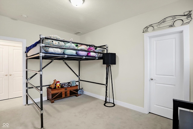 bedroom featuring carpet flooring