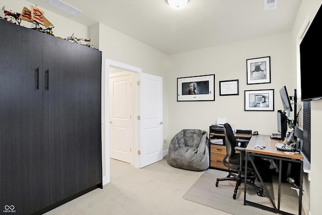 view of carpeted home office