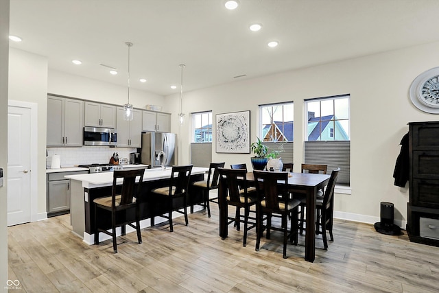 dining room featuring light wood-type flooring