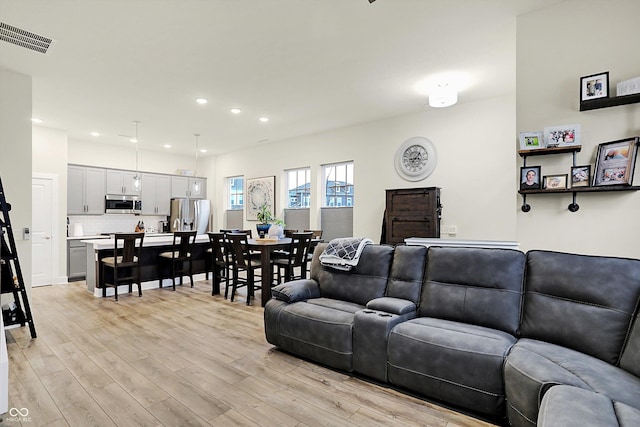 living room with light wood-type flooring