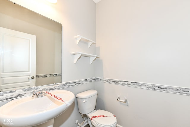 6927 Park Grove Blvd, Whitestown, IN 46075 - bathroom featuring a sink and a wainscoted wall