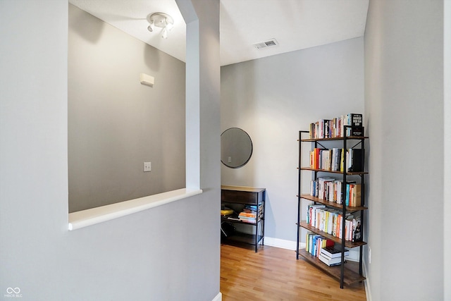 hall featuring hardwood / wood-style flooring