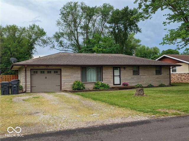 single story home featuring a front yard and a garage