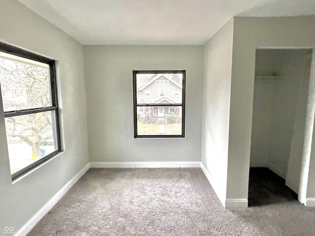 unfurnished bedroom featuring carpet