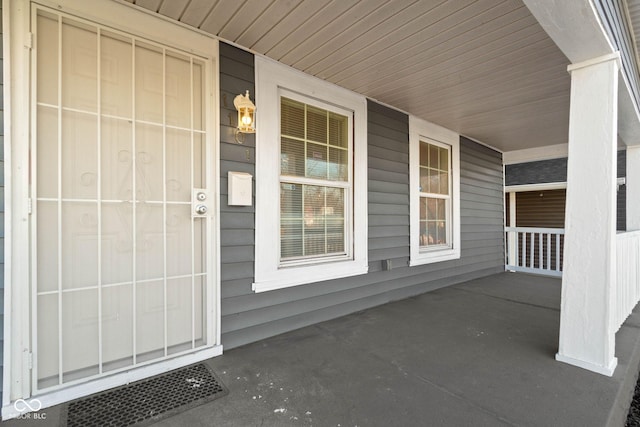 view of patio featuring a porch