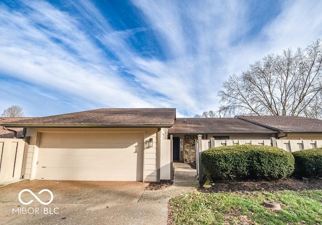 ranch-style house featuring a garage