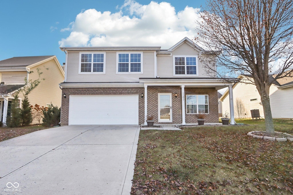 view of front of property with a garage