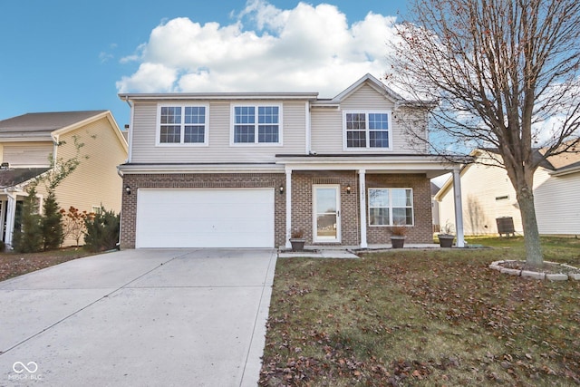 view of front of property with a garage