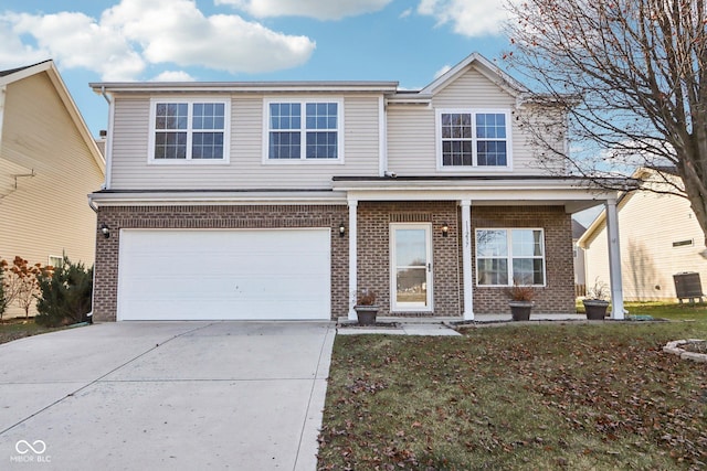 front of property with a garage