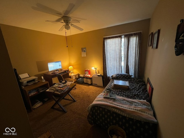 bedroom with ceiling fan and carpet floors