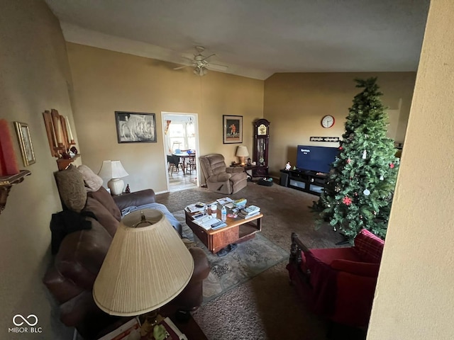 carpeted living room featuring ceiling fan and lofted ceiling