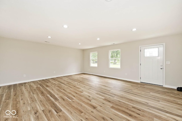 interior space with a healthy amount of sunlight and light hardwood / wood-style floors