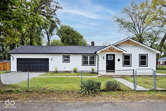 ranch-style home featuring a front yard and a garage