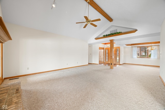 unfurnished living room featuring decorative columns, ceiling fan, beam ceiling, high vaulted ceiling, and carpet floors