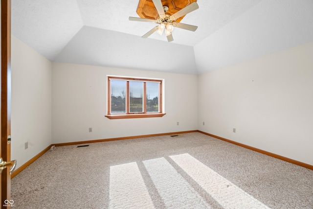 interior space featuring ceiling fan and lofted ceiling