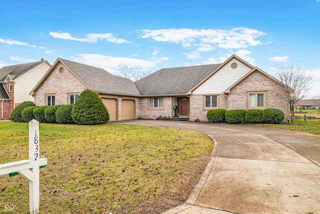 single story home with a garage and a front lawn