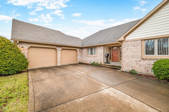 single story home with a garage