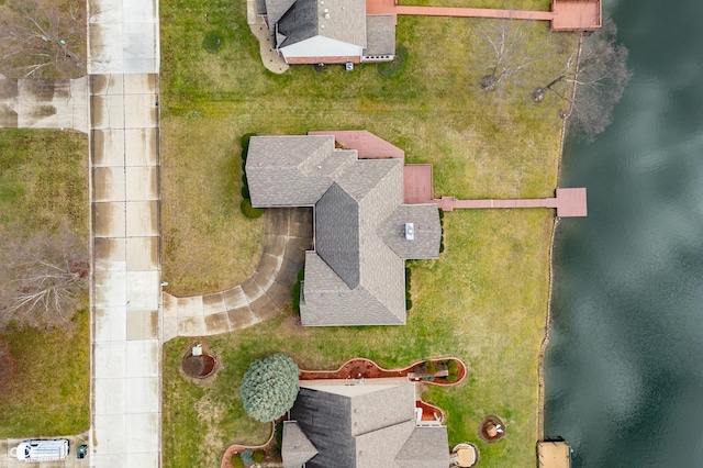 bird's eye view with a water view