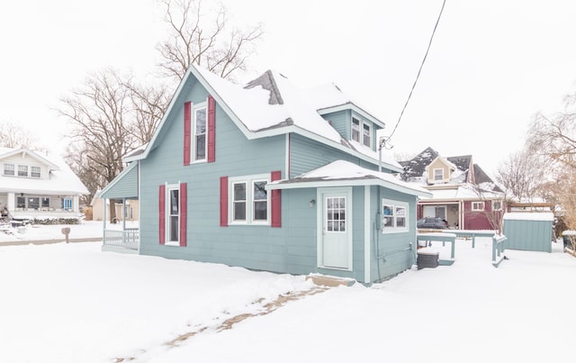 view of snow covered property