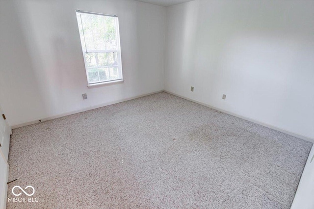 empty room with carpet flooring