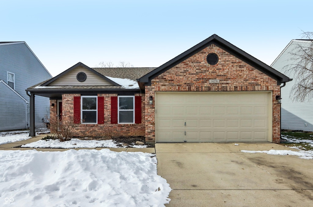 view of front of property featuring a garage