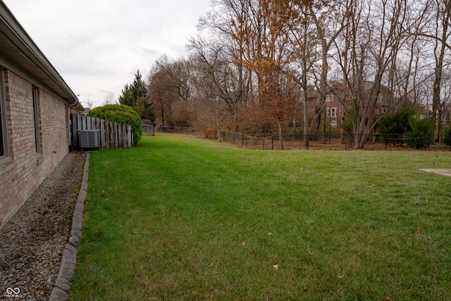 view of yard featuring central AC unit