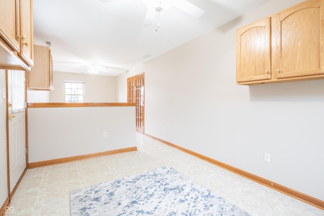 empty room featuring ceiling fan