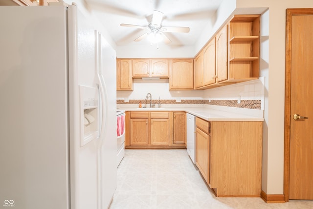 kitchen featuring ceiling fan, light brown cabinets, white appliances, and sink