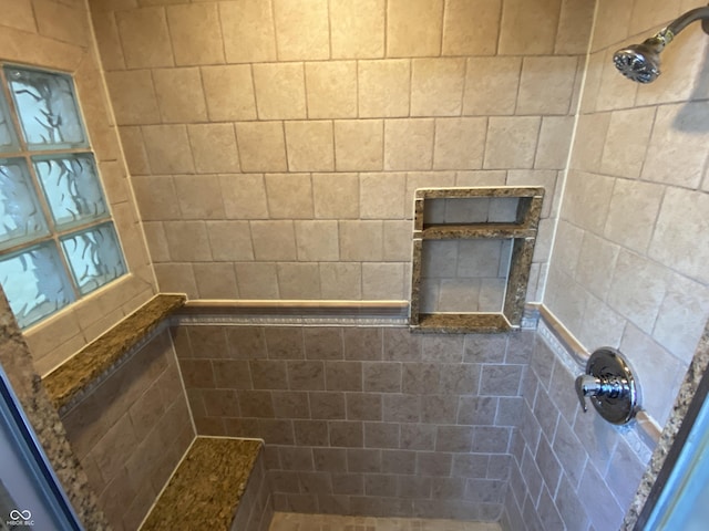 interior space with a tile shower