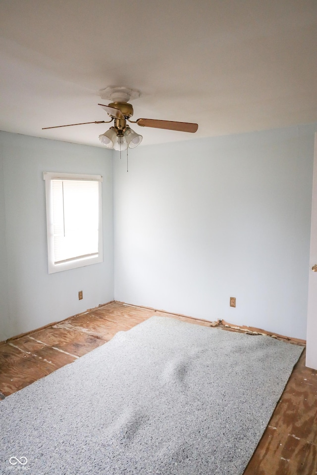 unfurnished room featuring wood-type flooring and ceiling fan