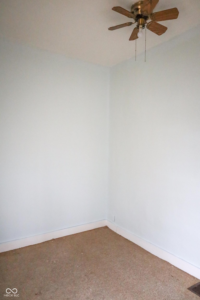 carpeted empty room with ceiling fan