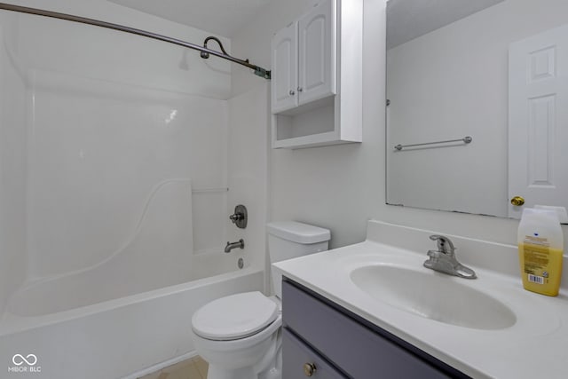 full bathroom with vanity, a textured ceiling, toilet, and shower / washtub combination