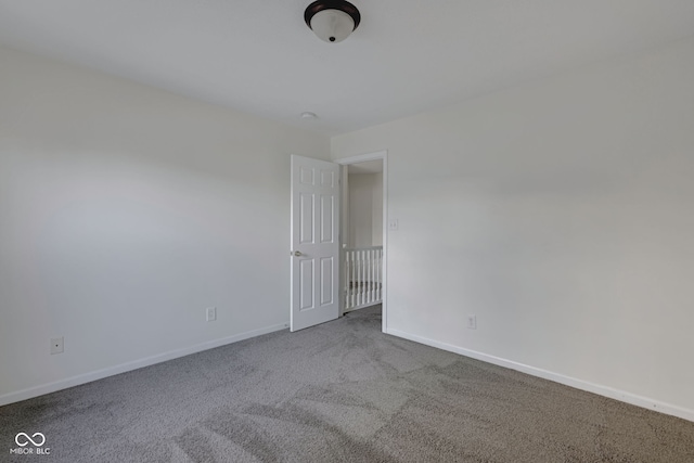 spare room featuring carpet flooring