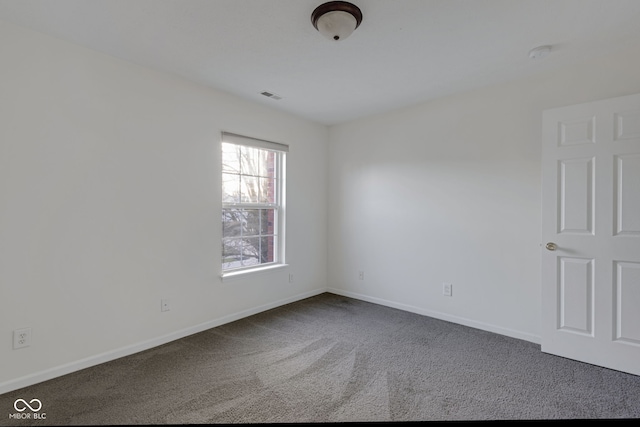 view of carpeted spare room