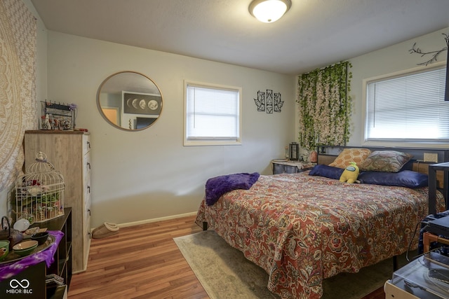 bedroom featuring hardwood / wood-style flooring