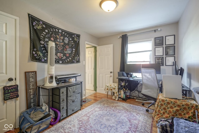 office with hardwood / wood-style flooring